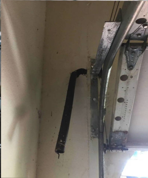 Extension springs on a garage door system